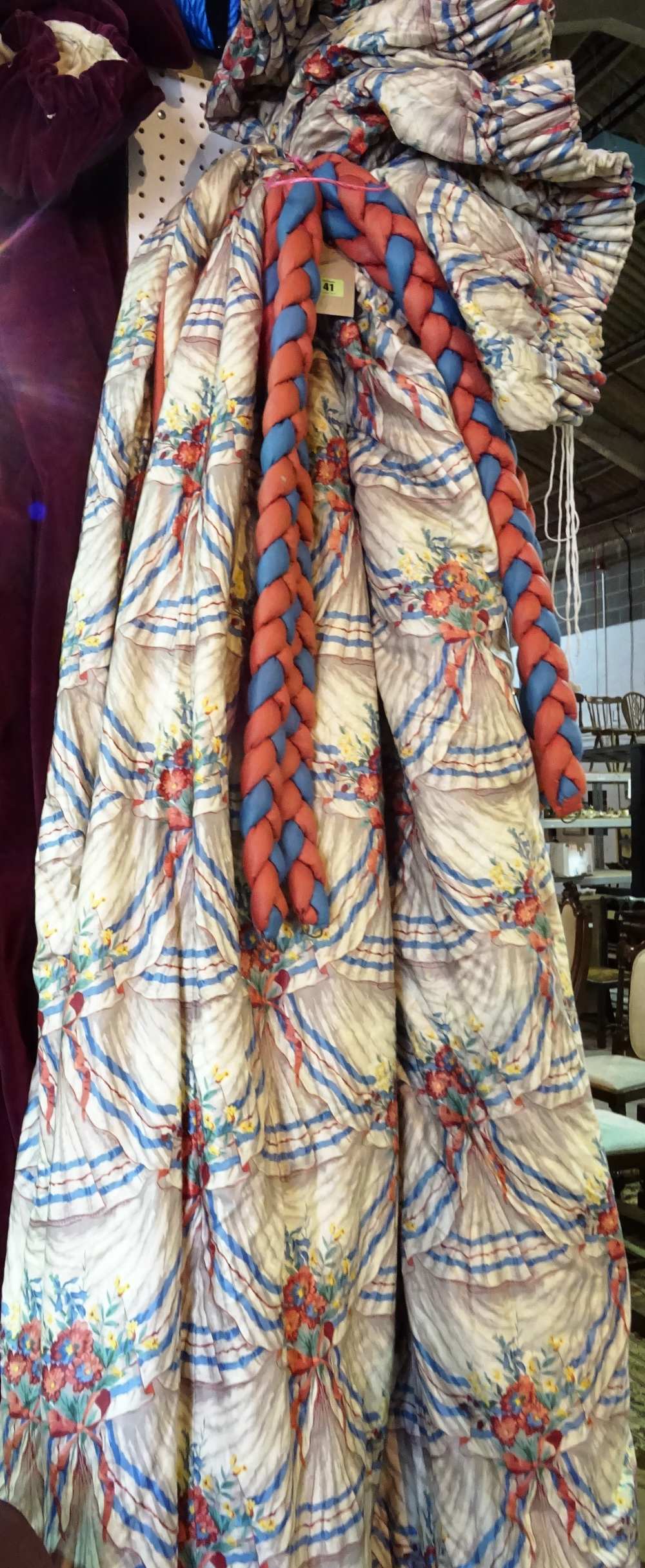Curtains, a pair of lined and interlined cream ground and red and blue repeating bouquet pattern,
