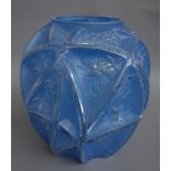 A Lalique style blue glass vase, 20th century, moulded with flowers against an ovoid ground,