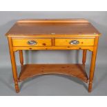 A 20th century pine dressing table with two drawers over platform undertier on tapering supports,