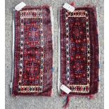 A pair of Yomut torba, each with deep chocolate mauve field, with stepped pole medallions,