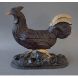 A Black Forest carved wooden novelty 'Chicken' jewellery casket, late 19th century,