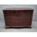A mid-18th century style mahogany serpentine chest of four long graduated drawers,