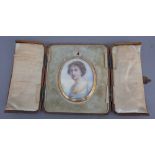 'EH', a late 19th/early 20th century British School portrait miniature on ivory of a woman,