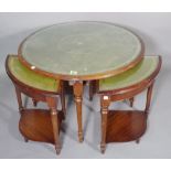 A Regency style mahogany circular coffee table with four integral pull out corner tables on fluted