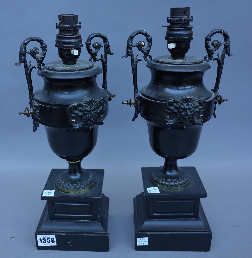 A pair of black slate, marble and ormolu mounted urns 19th century (converted to table lamps),