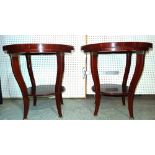 A pair of 20th century mahogany circular occasional tables, 75cm wide x 75cm high.