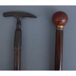An early 20th century gadget cane with illuminating spherical pommel (91.