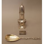 Silver, comprising; an octagonal sugar caster, raised on an octagonal foot, Sheffield 1936,