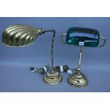 An Edwardian style gilt metal adjustable desk lamp with green glass shade and a stepped circular