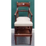 A Regency mahogany child's high chair, on square stand with turned supports, 39cm wide x 93cm high.