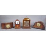 A walnut cased 17th century style mantel timepiece, an oak arched case mantel clock,