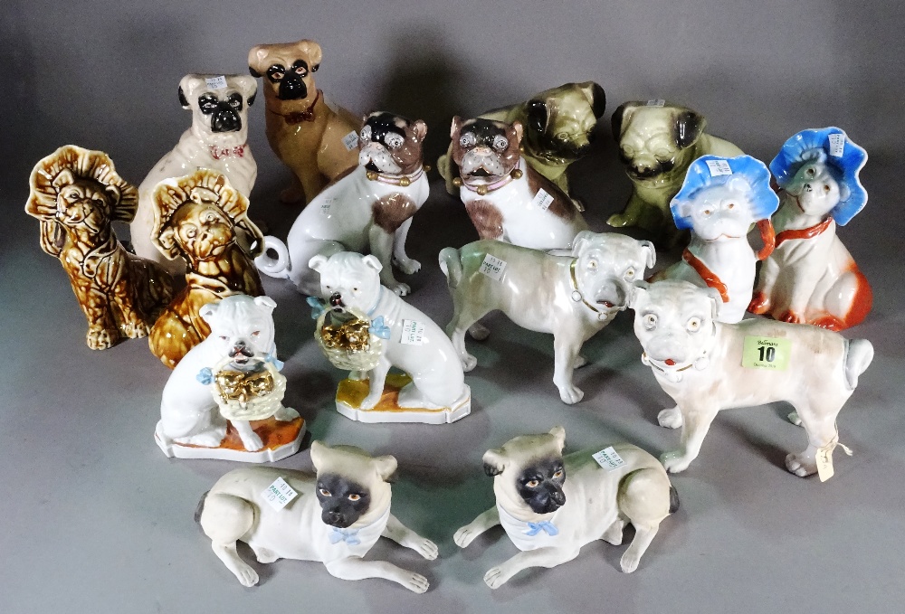 A quantity of Victorian and later ceramic models of pugs, mostly pairs, (qty).