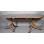 A Victorian 'D' end dining table on fluted downswept supports,