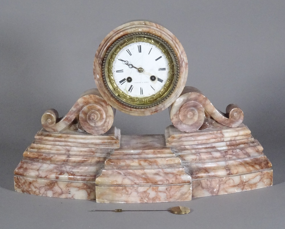 An early 20th century rose marble French mantel clock.