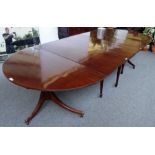A made-up 19th century mahogany triple section 'D' end extending dining table with central drop