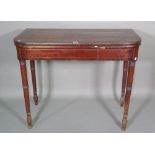 A Regency mahogany brass inlaid card table on ring turned tapering supports, 92cm wide x 77cm high.