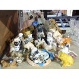 A quantity of Victorian and later ceramic models of pugs, (qty).