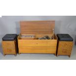 A 20th century teak cased Garrard record player and a pair of speakers/ stools with cushioned