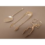 Silver, comprising; a pair of Victorian harlequin sugar nips, London 1845, a preserve spoon,