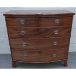 A Regency mahogany bowfront chest with four long graduated drawers on splayed bracket feet,