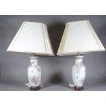 A pair of 20th century Chinese porcelain baluster vases converted to lamps, 35cm high. (2).