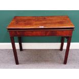 A mid-18th century mahogany card table, the foldover rectangular top on canted square supports,