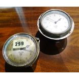 A 'Smiths' brass cased automotive or aeronautical clock, 7cm wide and another similar steel clock,