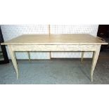 A 20th century white painted pine extending dining table on tapering splayed supports,