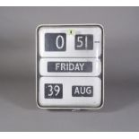 A Gensign digital clock and calendar.