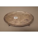 A silver oval small salver,