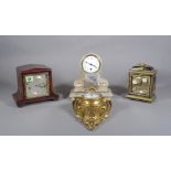 A French gilt metal cartel timepiece, a French alabaster mantel timepiece,