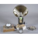 A vintage marble and nickel alarm timepiece table lamp, a car dash mounted timepiece,