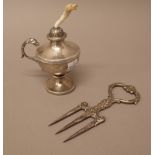 A table lighter, of urn shaped form, the handle with a mythological animal head finial,