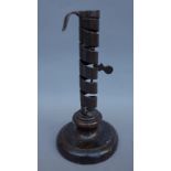 A sheet brass Hogscraper candlestick, circa 1790, 18cm high,