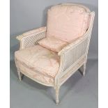 A set of three stained beech Louis XVI style bergere armchairs with pink upholstery, (3).