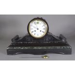 An early 20th century black slate cased mantle clock with 8 day movement, 46cm wide.