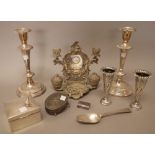 Silver and silver mounted wares, comprising; two similar vases with embossed decoration,