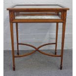 An Edwardian marquetry inlaid mahogany bijouterie table on tapering square supports,