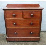 A Victorian mahogany chest of two short