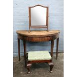 A George III mahogany demi lune fold over top tea table, 91cm wide x 44cm deep x 70cm high,