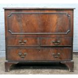 A reproduction mahogany sewing cabinet, with divided hinged top and three drawers under,