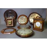 A large quantity of mostly 19th century and later dial and wall clocks, some lacking movements,