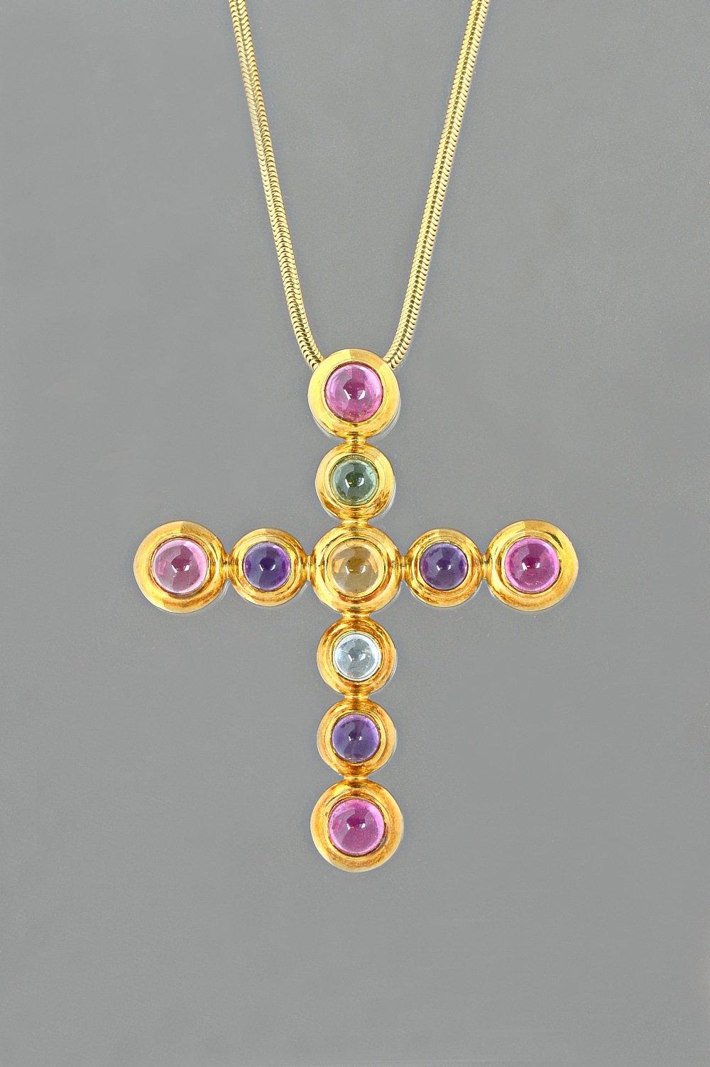 A Tiffany & Co Paloma Picasso gold and cabochon gemstone set pendant cross,