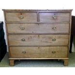 A George III mahogany chest of two short and three long drawers,