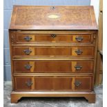 A reproduction George III style yewwood and inlaid bureau, 81cm wide x 41cm deep x 96cm high.