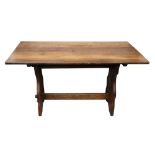 Three reproduction stick and wheel back Windsor chairs and oak refectory style dining table,