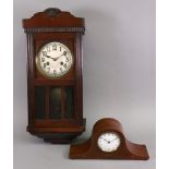 A mahogany cased wall clock chiming on a gong, 55cm high,