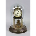 A brass Anniversary timepiece, under a glass dome, 27cm high.