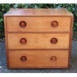 A Victorian mahogany chest of three long drawers, originally part of a larger piece of furniture,