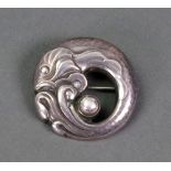 A Georg Jensen silver brooch, the circular design depicting a fish, stamped 10, approx. 31.